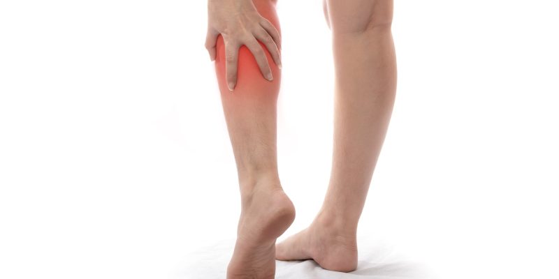 woman-with-calf-feeling-pain-white-background-women-suffering-from-pain-leg (1)-min